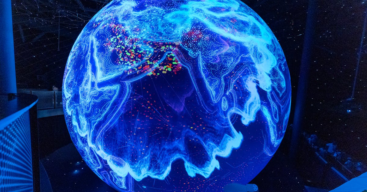 A vibrant illuminated globe display showcasing technological advancements at a science museum.